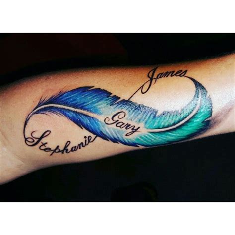 feather tattoo with name inside